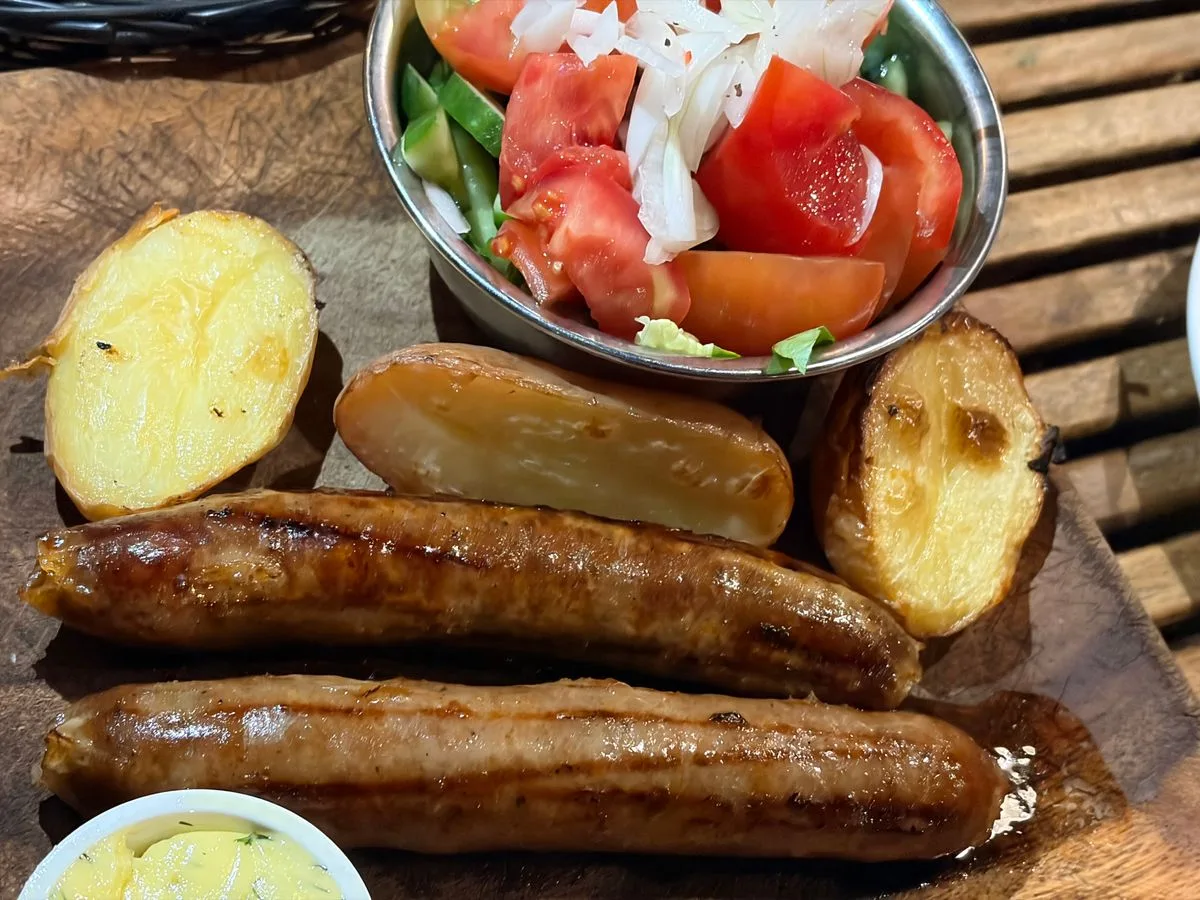 Grilled Sausages with Roasted Potatoes and Fresh Salad